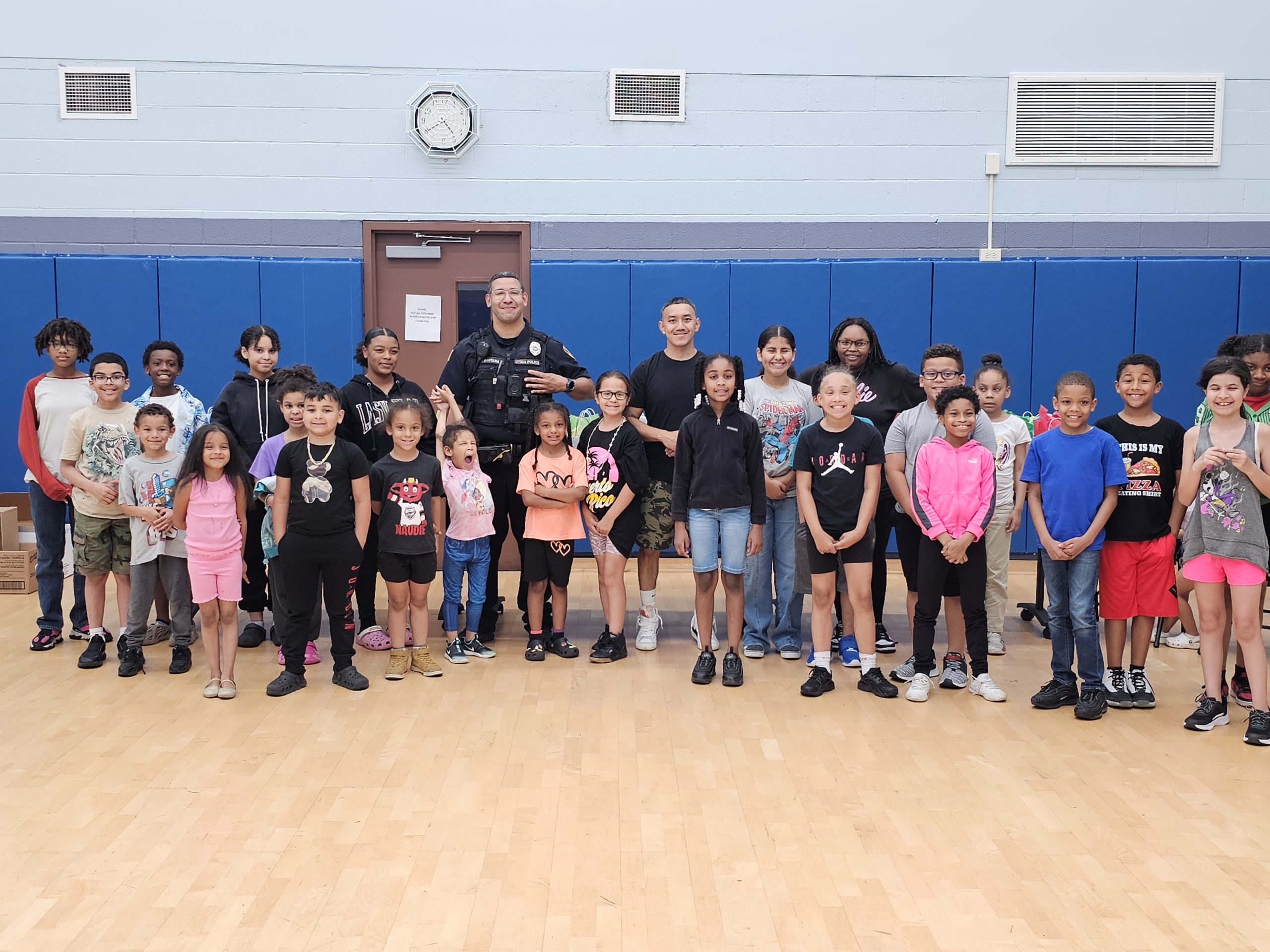 The Neighborhood Center’s Outreach & Prevention Program delivered 77 care packages to the officers of the Utica Police Department background image