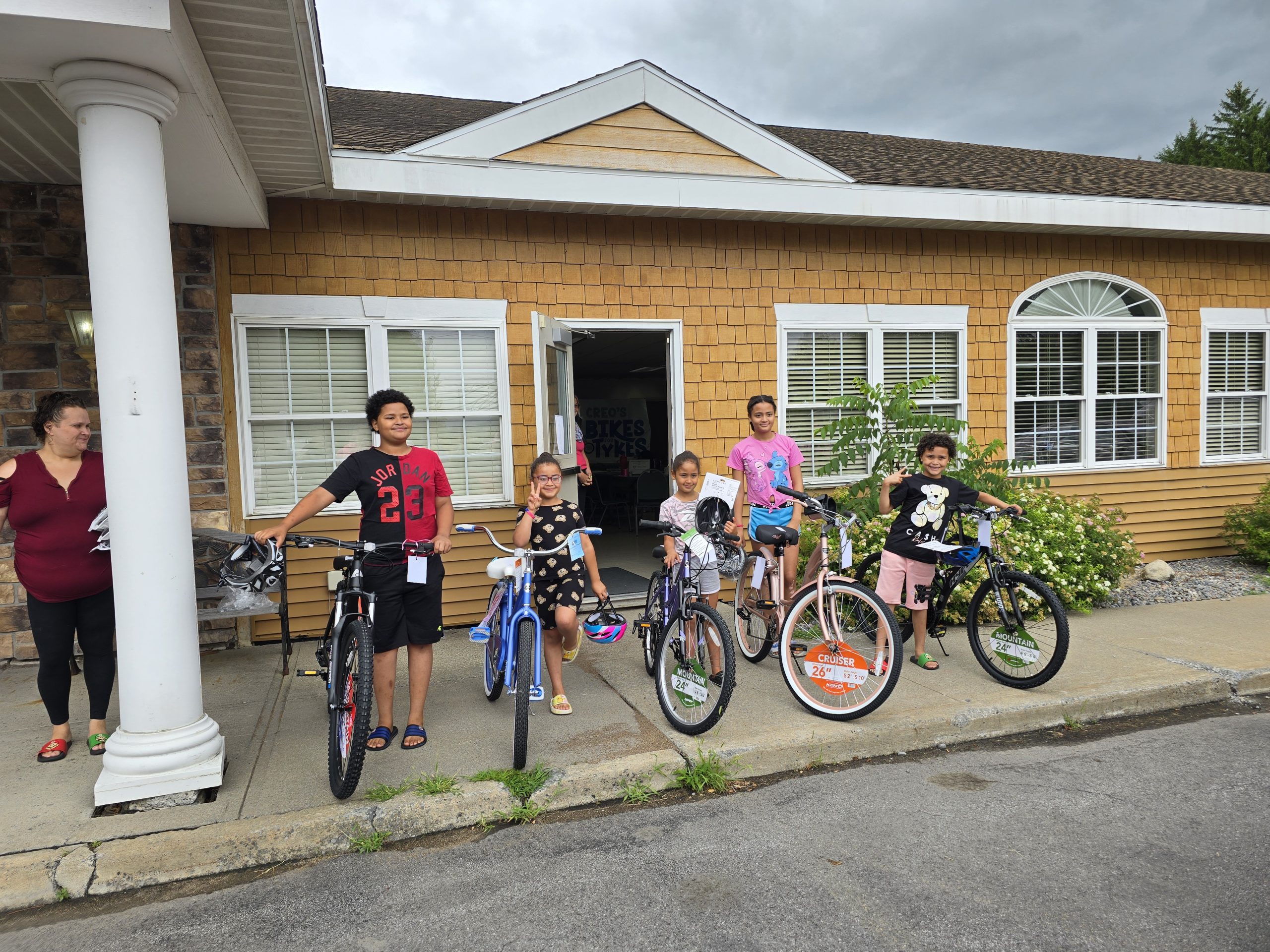 The Neighborhood Center Hosts Another Successful Creo’s Bikes for Tykes Giveaway with Support from the Edwin J. Wadas Foundation background image