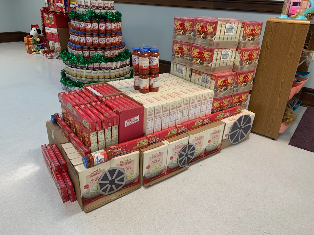 Neighborhood Center Holiday Food Drive Empowers Families and Teaches the Next Generation of Leaders